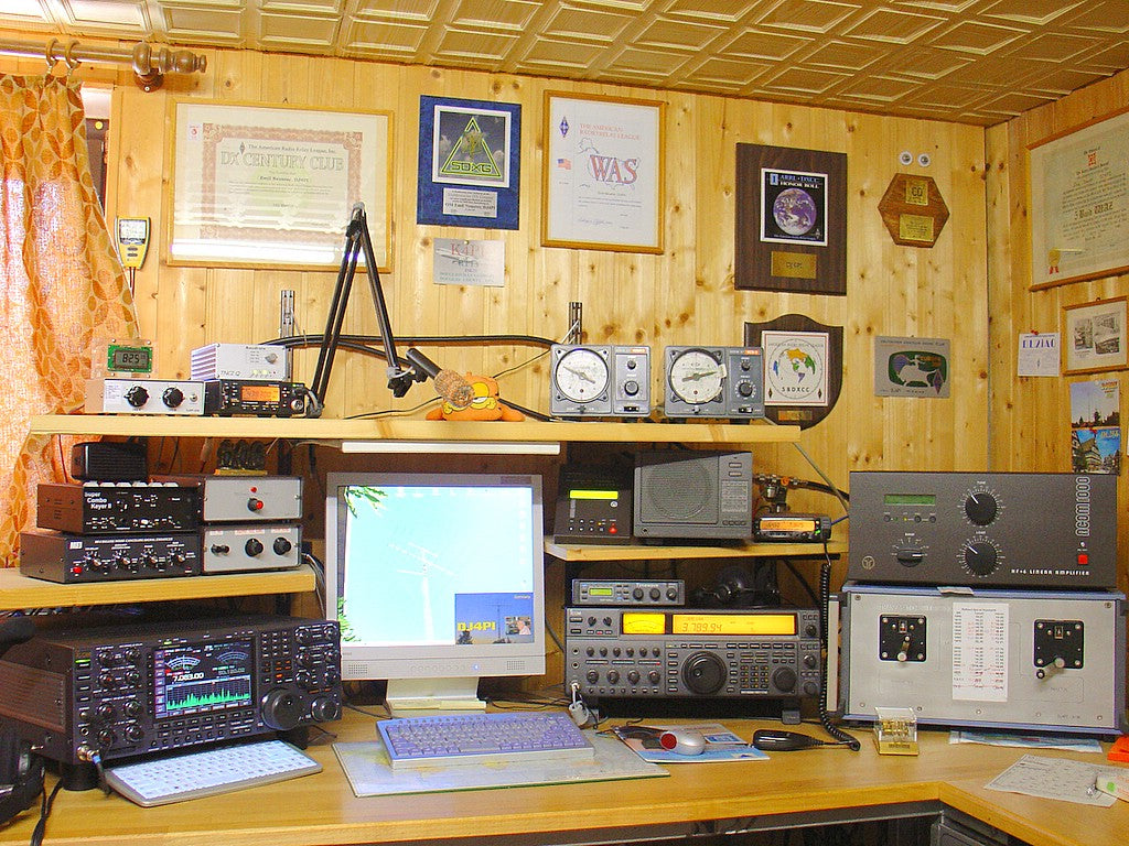 Amateur radio operator using a ham radio transceiver in India
