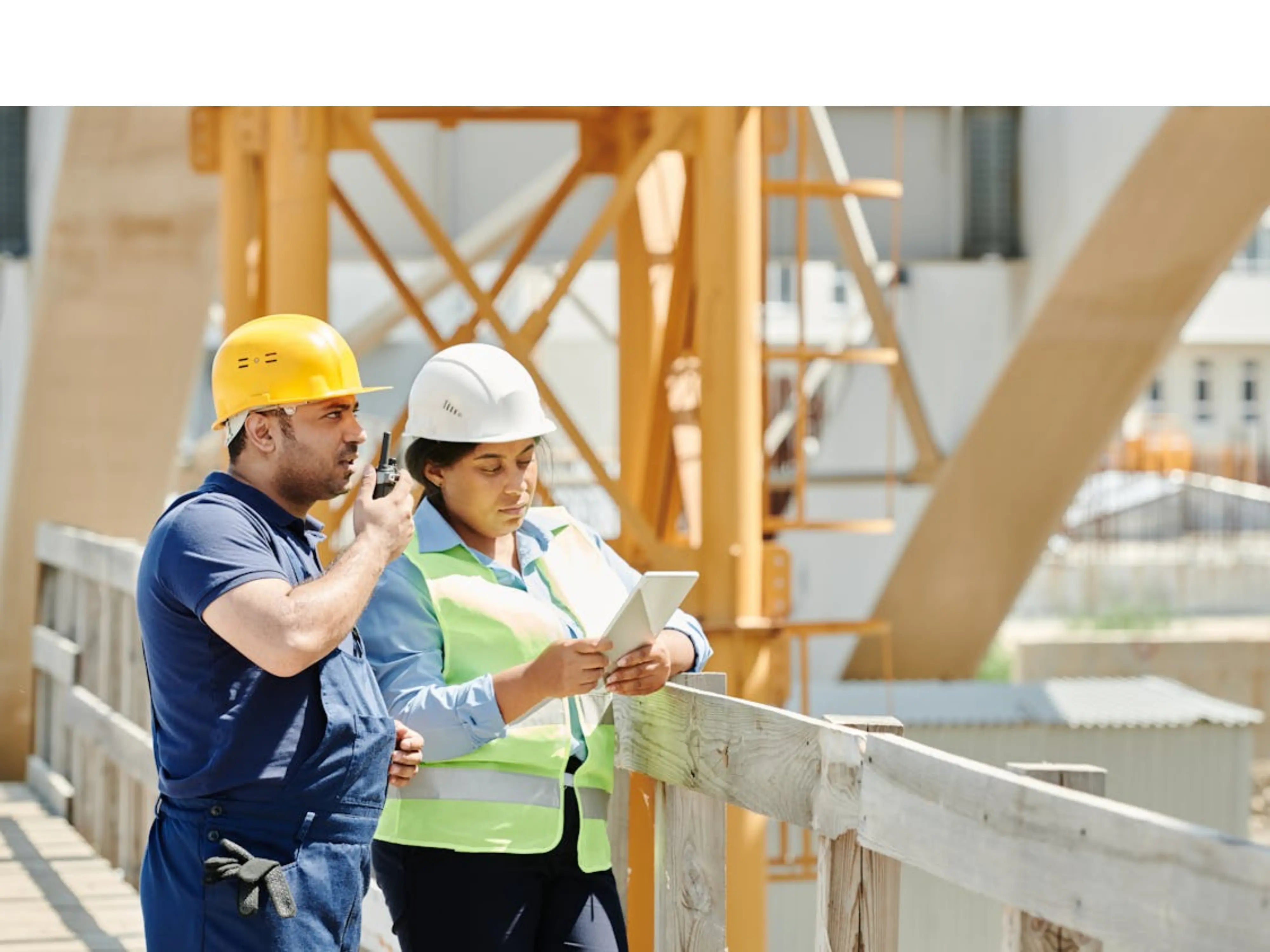 Business team using handheld walkie talkies for workplace communication